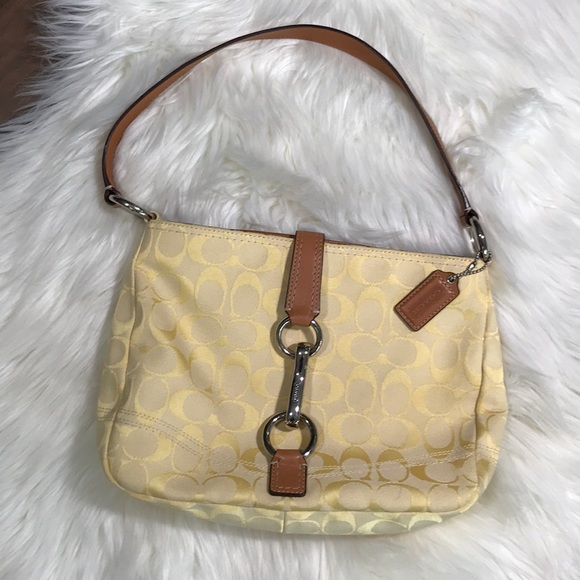 Coach Handbags - Coach light yellow purse EUC